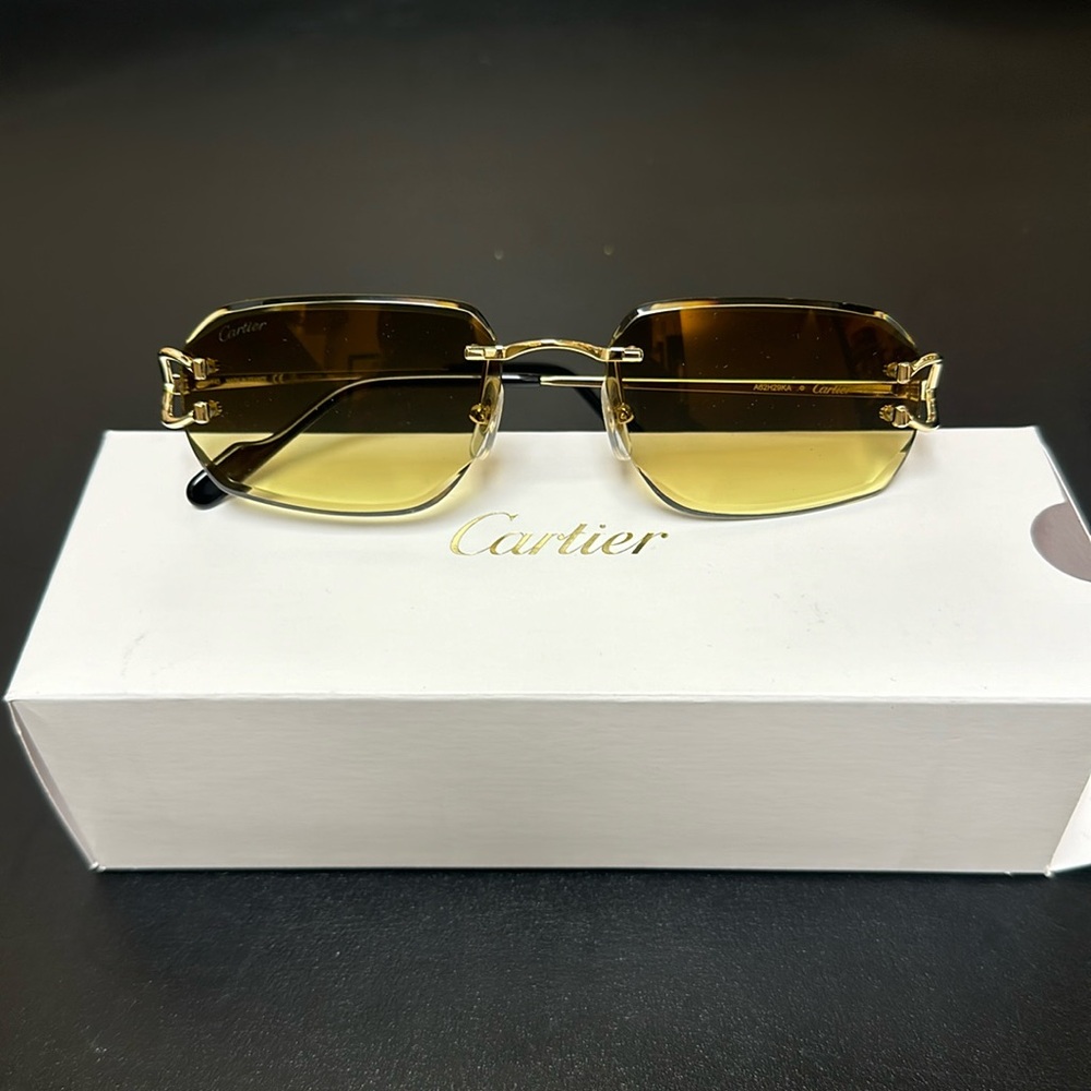 Cartier ct0468s gold/ amber lens sunglasses